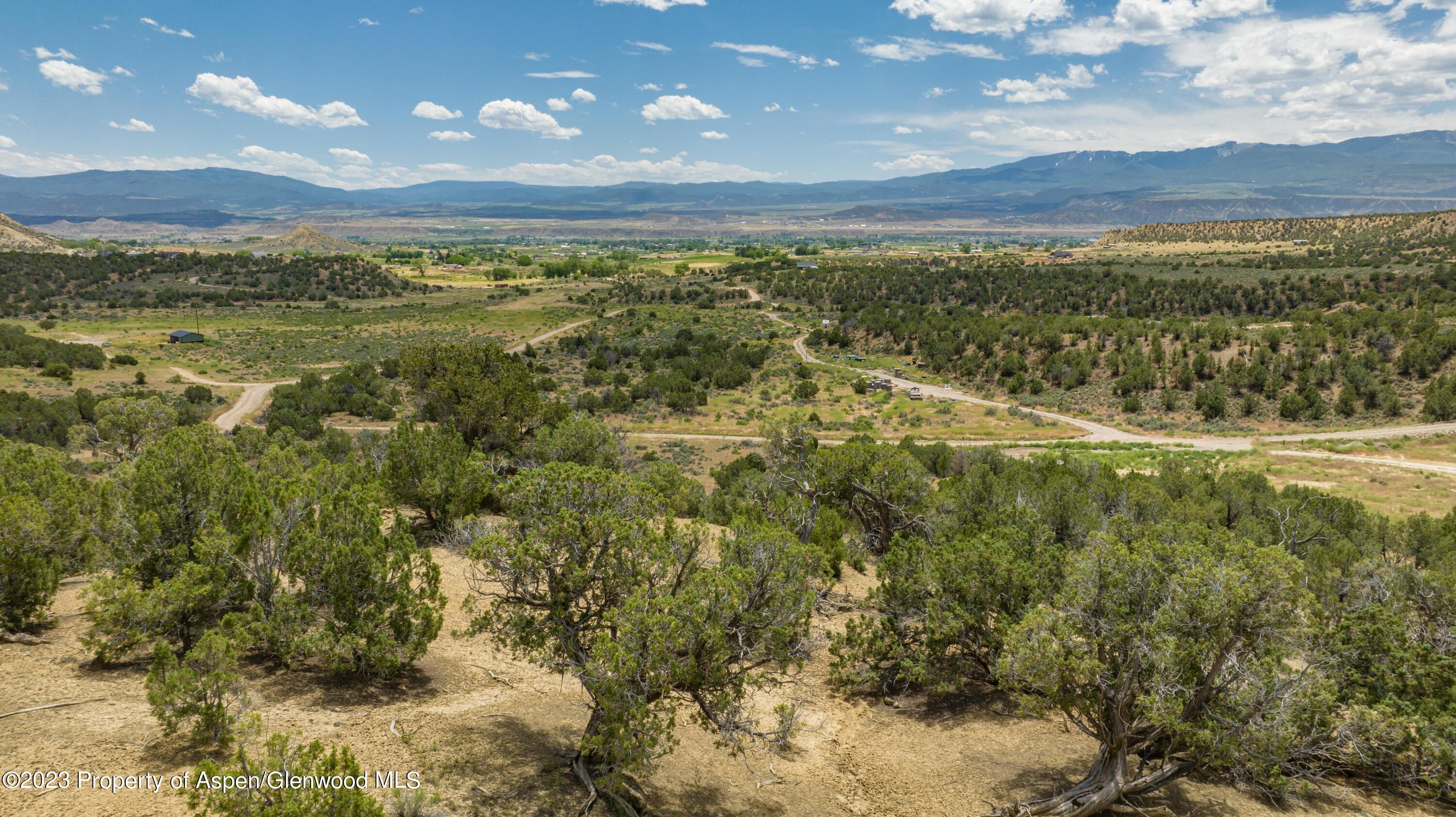 a view of an ocean and mountain