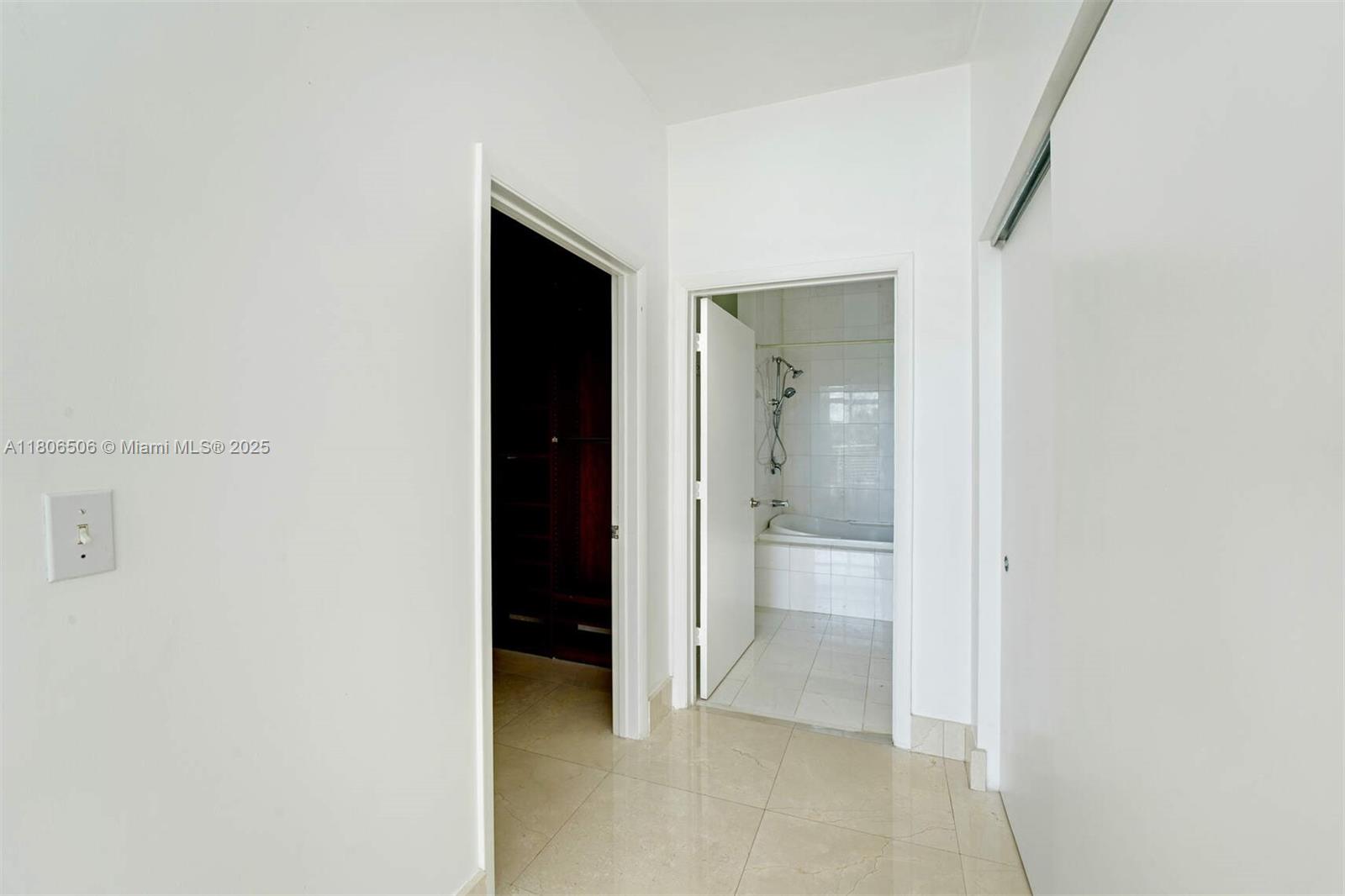 2001 Meridian Avenue, Unit 516 Miami Beach, FL 33139 - Photo 11 of 26 an empty room with a bathroom and a sink