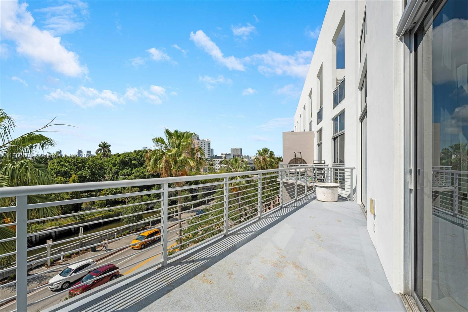 2001 Meridian Avenue, Unit 516 Miami Beach, FL 33139 - Photo 16 of 26 a view of balcony with furniture