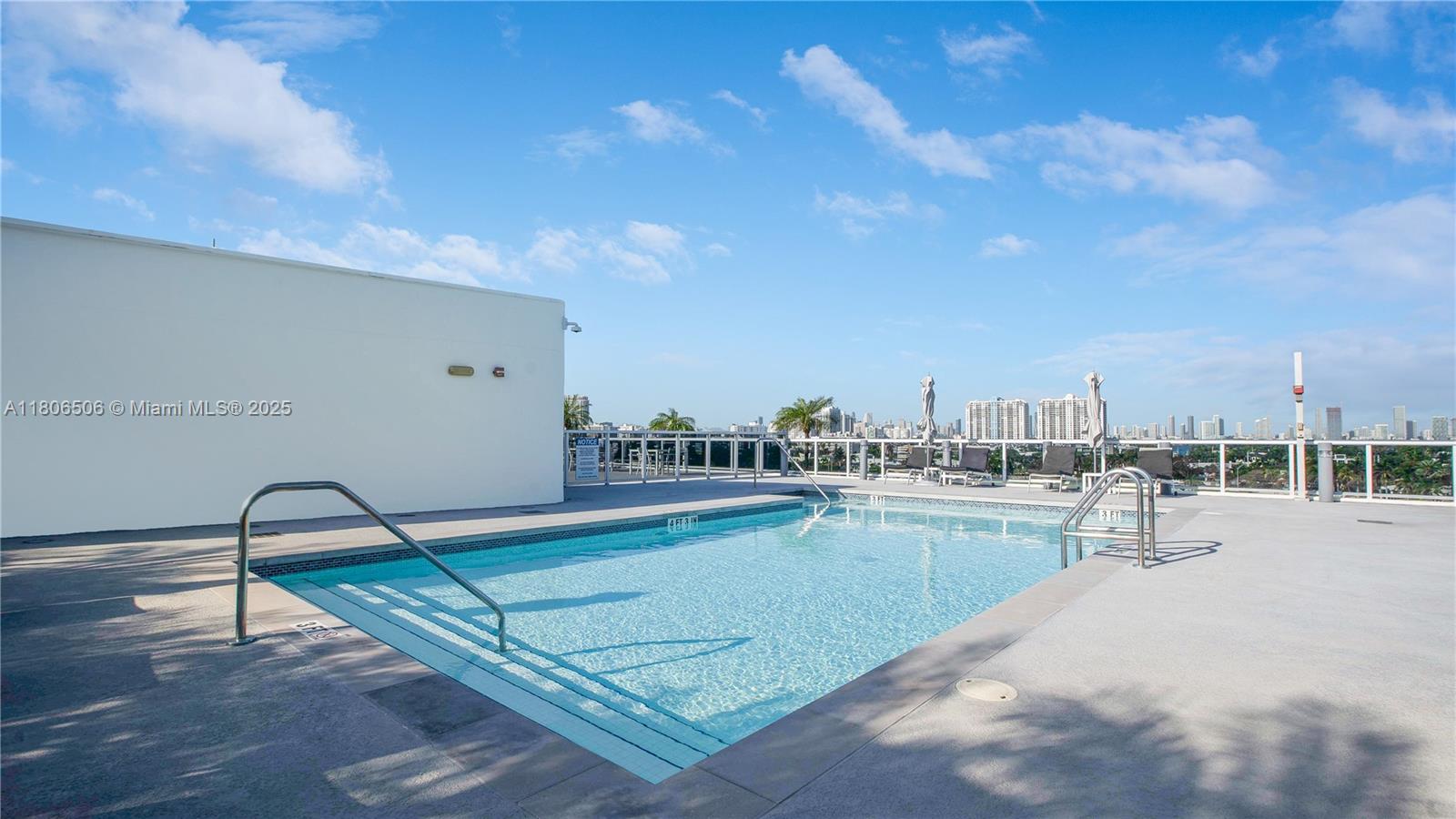 2001 Meridian Avenue, Unit 516 Miami Beach, FL 33139 - Photo 19 of 26 a view of a swimming pool and a back yard