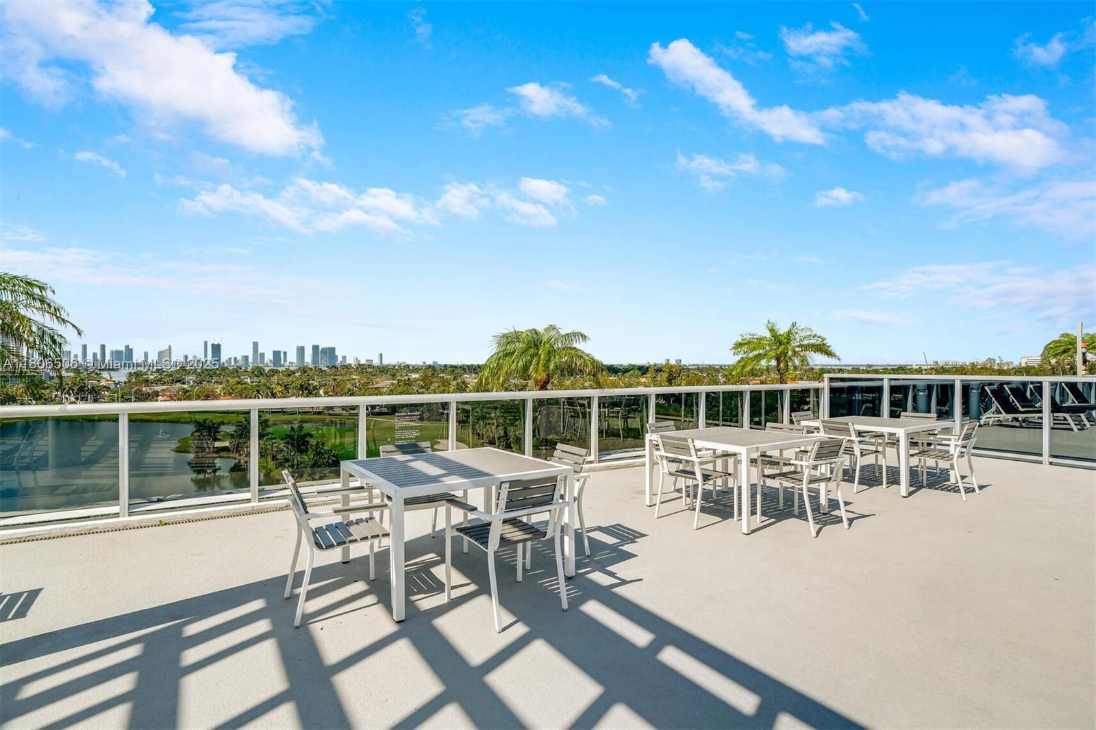 2001 Meridian Avenue, Unit 516 Miami Beach, FL 33139 - Photo 20 of 26 a view of a chairs and table on the terrace