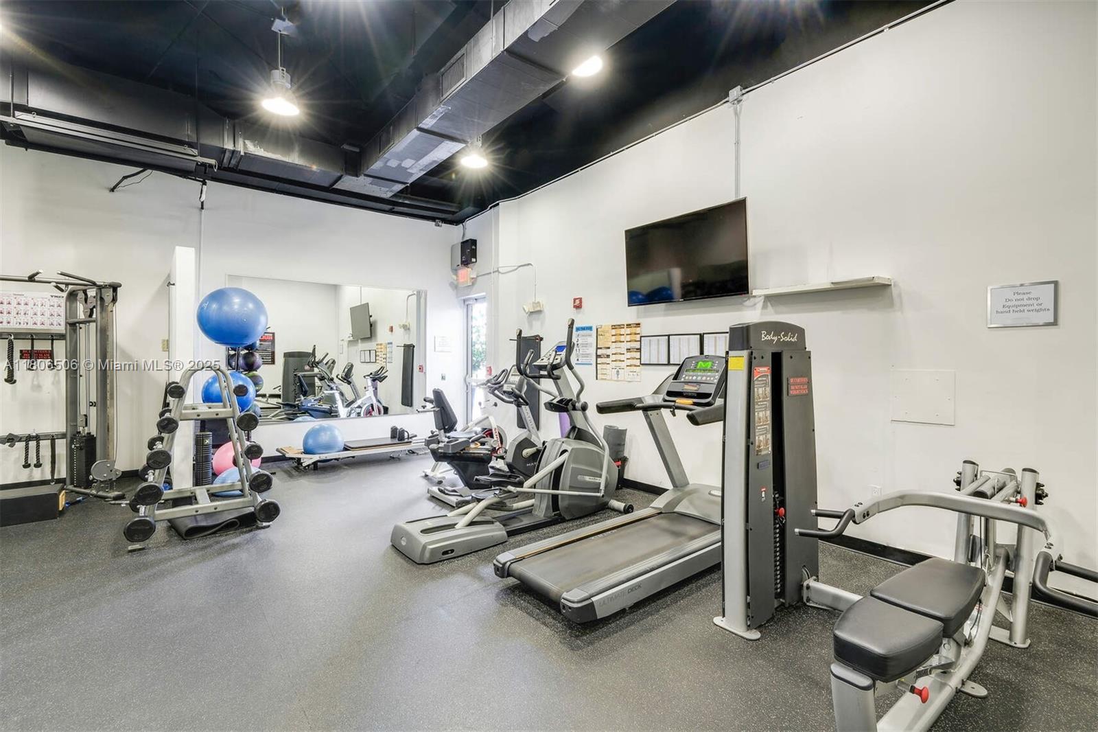 2001 Meridian Avenue, Unit 516 Miami Beach, FL 33139 - Photo 26 of 26 a view of a room with gym equipment
