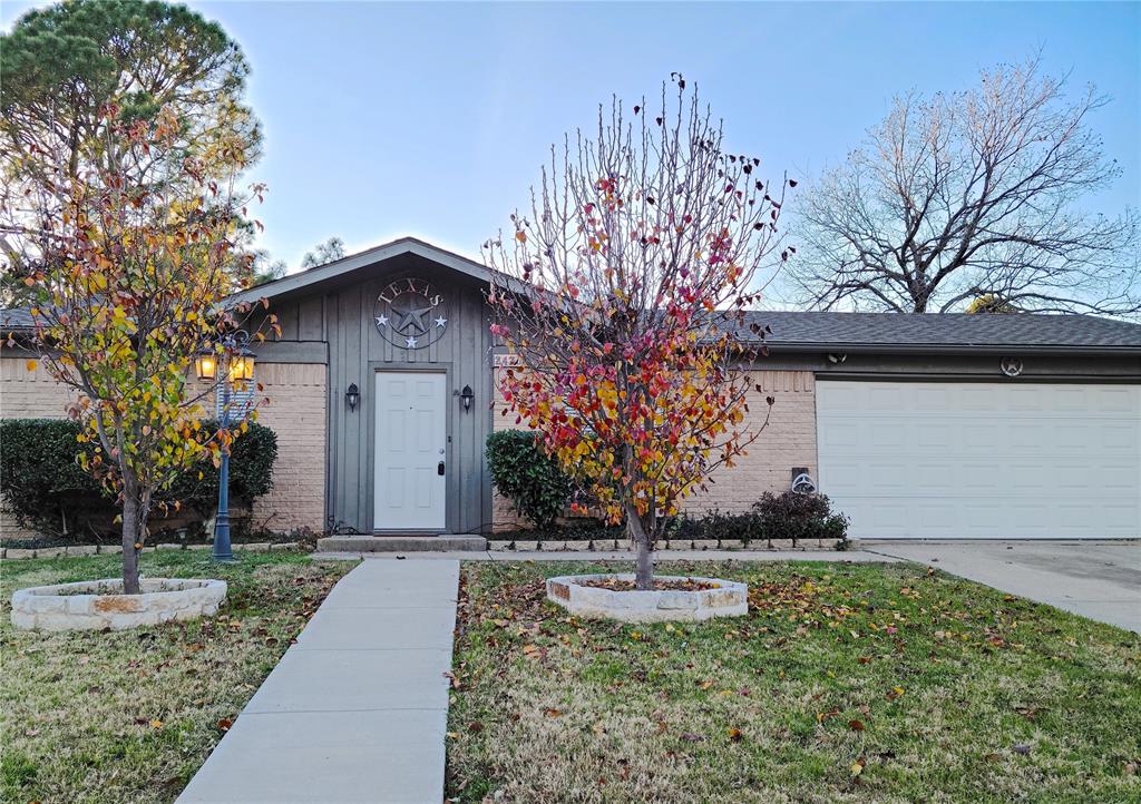 2420 South Fielder Road Arlington, TX 76015 - Photo 1 of 1 a front view of a house with garden