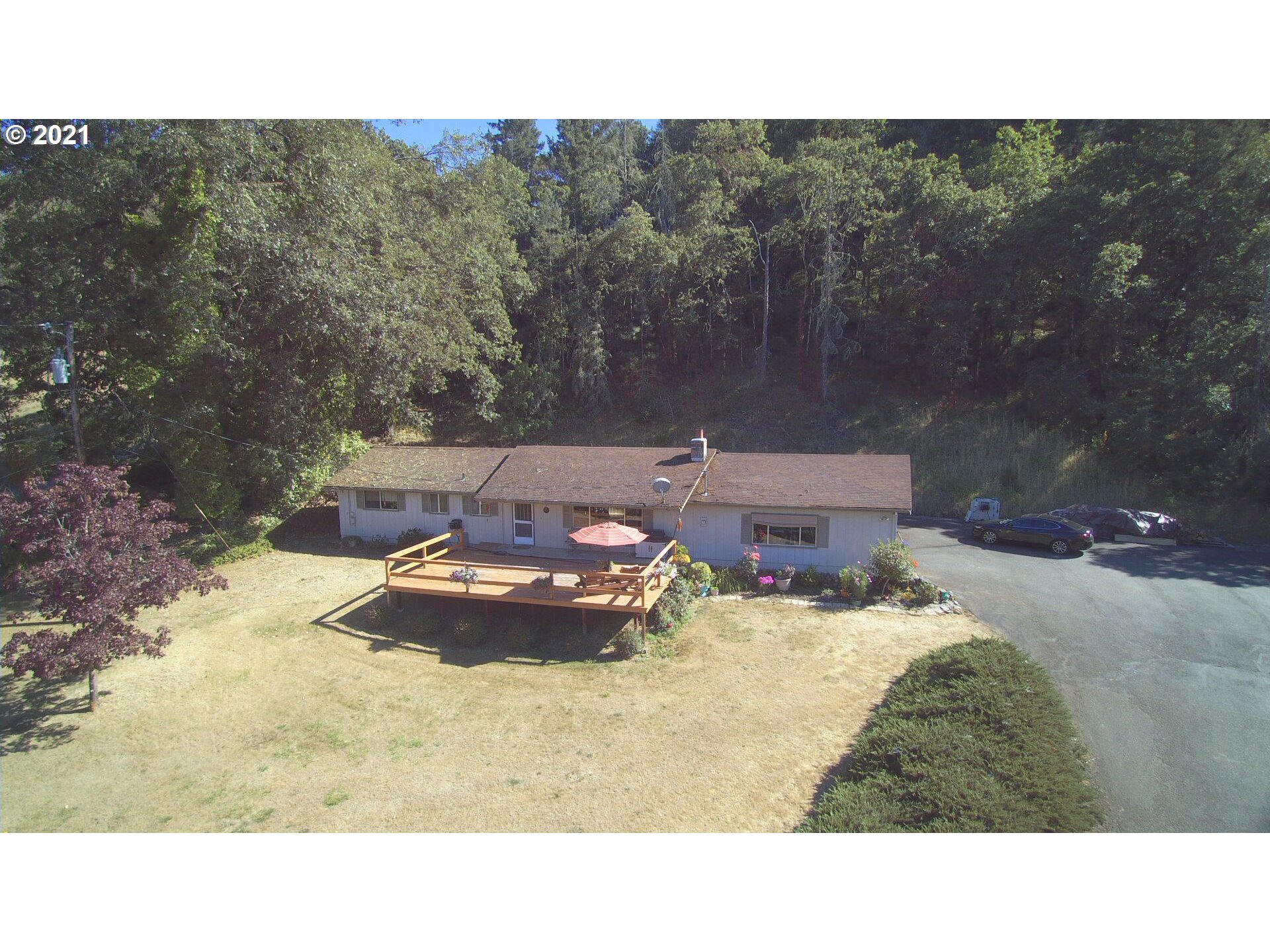 4235 Shoestring Road Riddle, OR 97469 - Photo 2 of 30 a view of a backyard with a sink