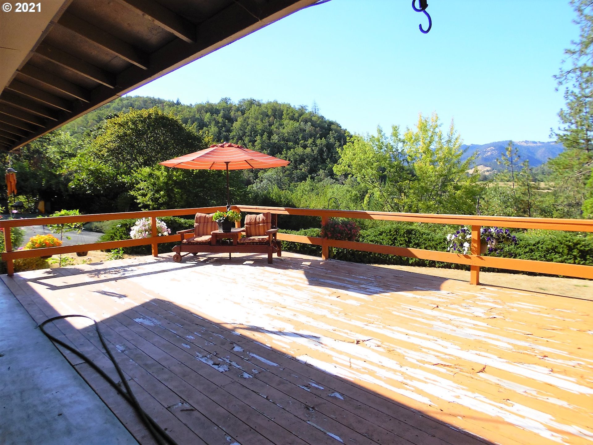4235 Shoestring Road Riddle, OR 97469 - Photo 18 of 30 a view of a swimming pool with a patio
