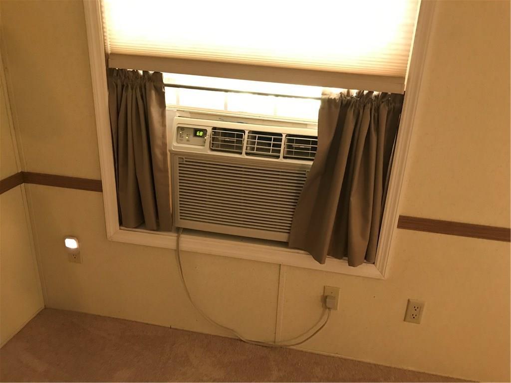 63 Juniper Circle Rome, ME 04963 - Photo 27 of 34 Large in window a/c unit. Cools off...