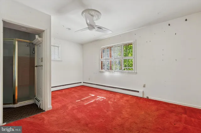 an empty room with windows