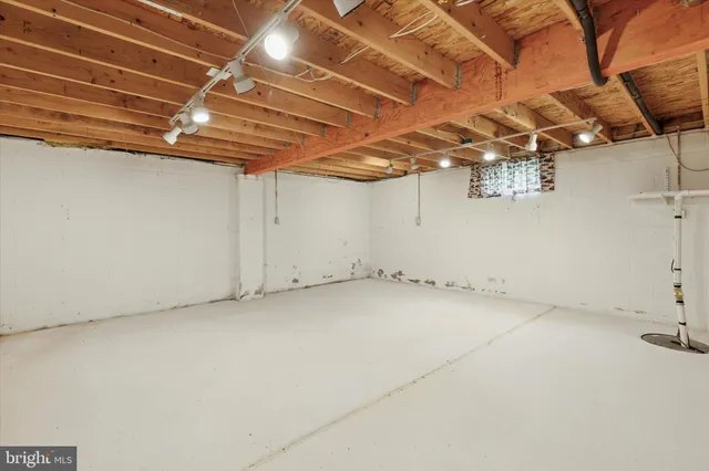a view of a room with wooden walls