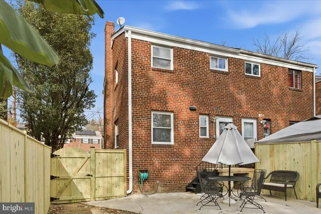 a house with trees in front of it