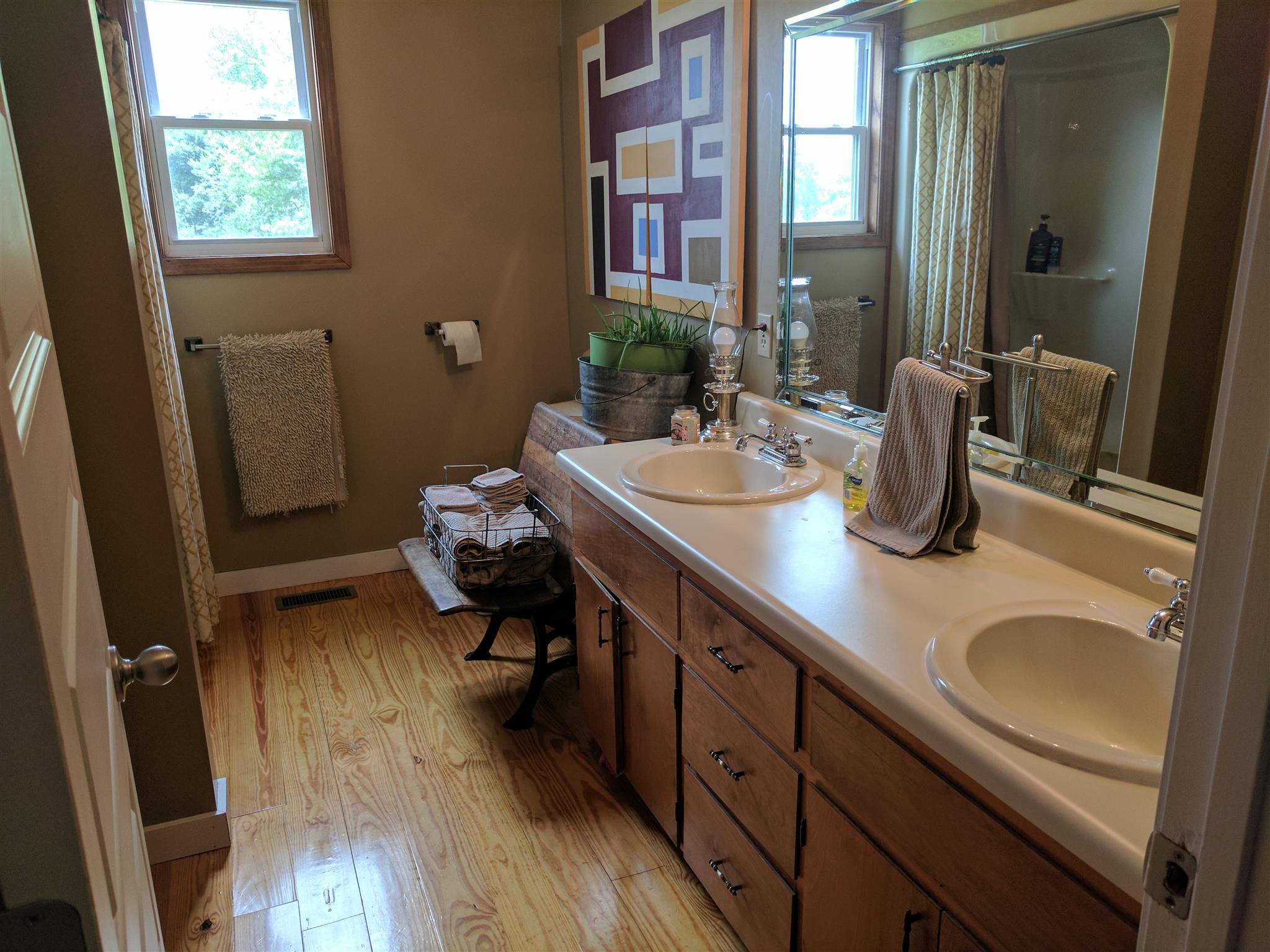 489 Ab Wade Road Portland, TN 37148 - Photo 12 of 23 a bathroom with a sink double vanity granite and a mirror