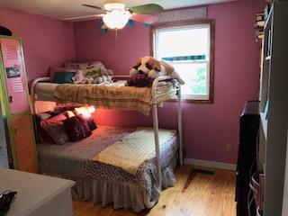 489 Ab Wade Road Portland, TN 37148 - Photo 10 of 23 a bedroom with bed and a window