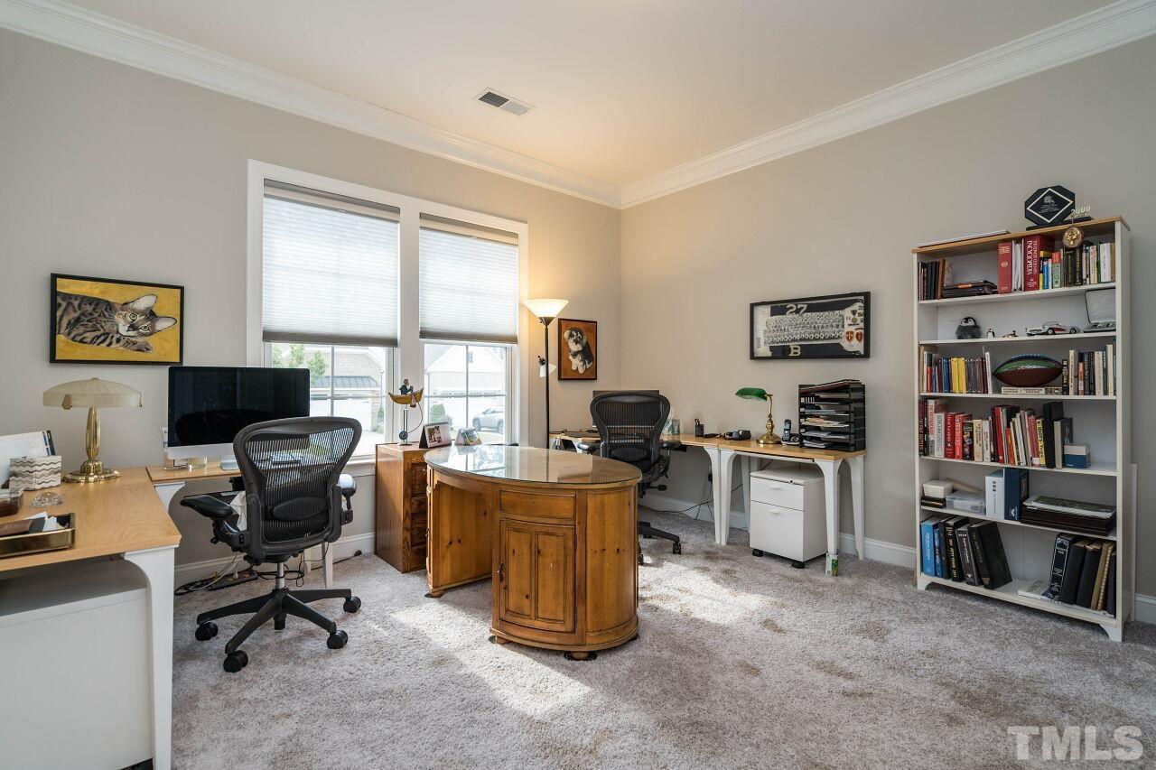 129 Damsire Way Cary, NC 27513 - Photo 25 of 32 a view of a workspace with furniture and a window