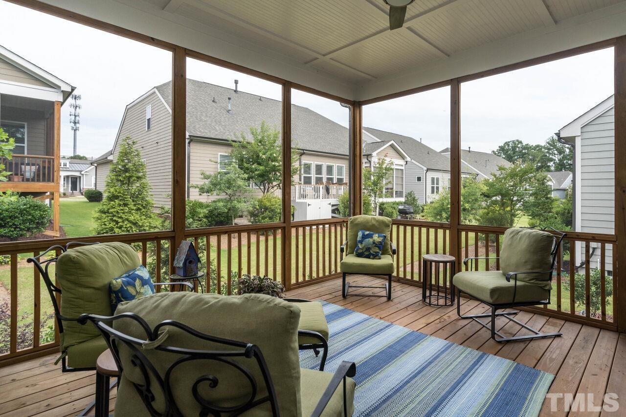 129 Damsire Way Cary, NC 27513 - Photo 28 of 32 a view of balcony with furniture and wooden floor