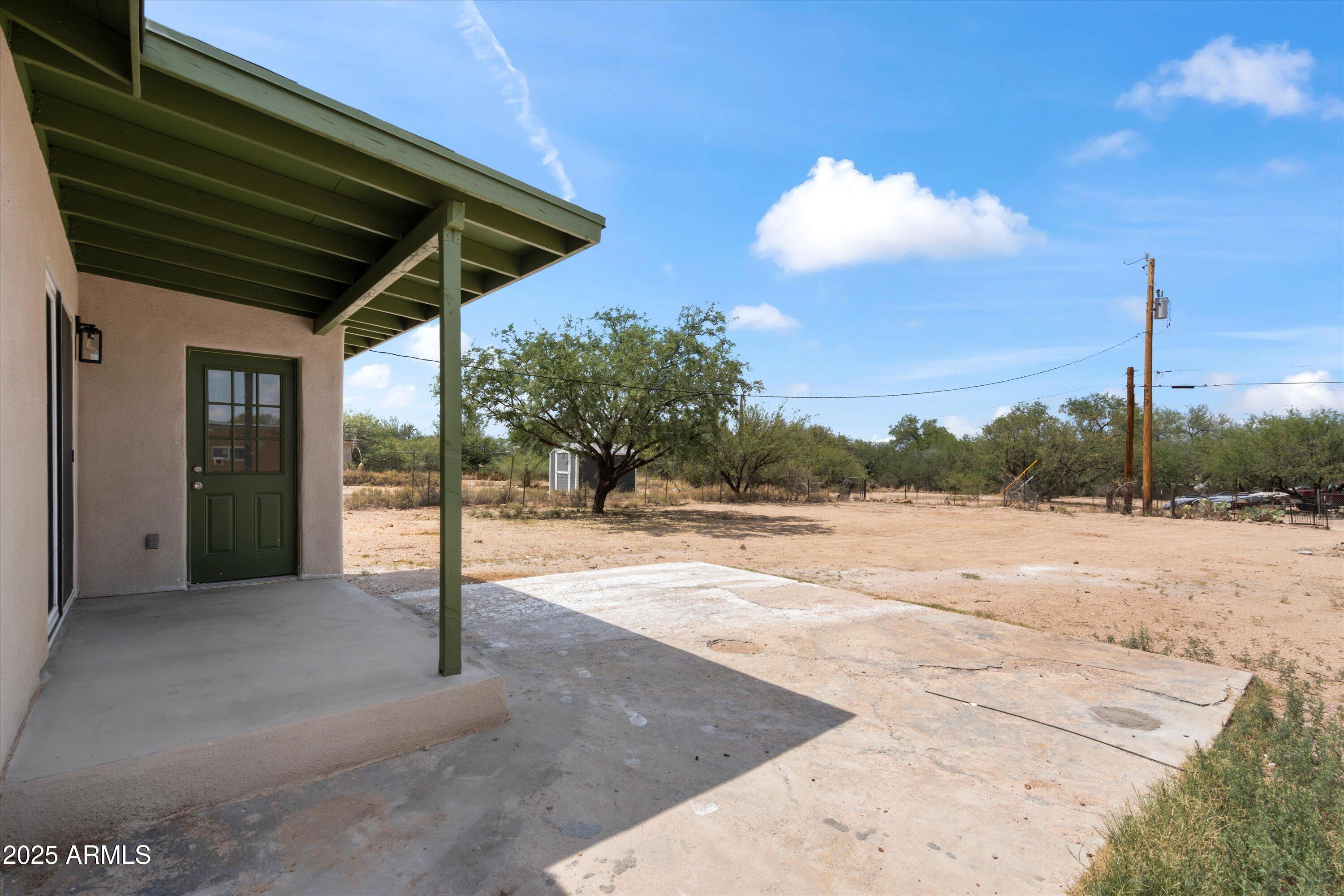 468 West Duane Street Benson, AZ 85602 - Photo 18 of 21 a view of backyard with porch