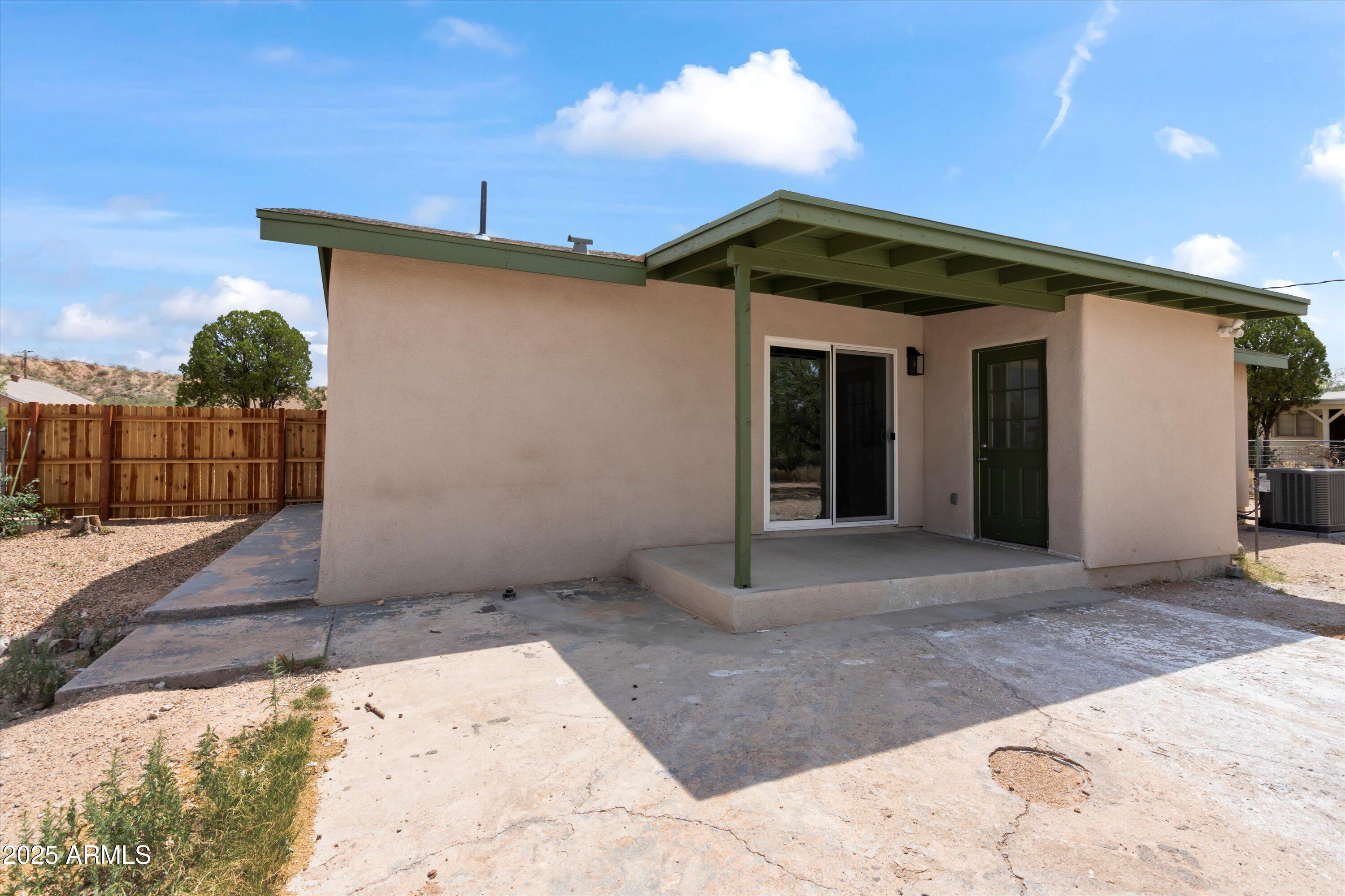 468 West Duane Street Benson, AZ 85602 - Photo 19 of 21 a view of a house with a yard