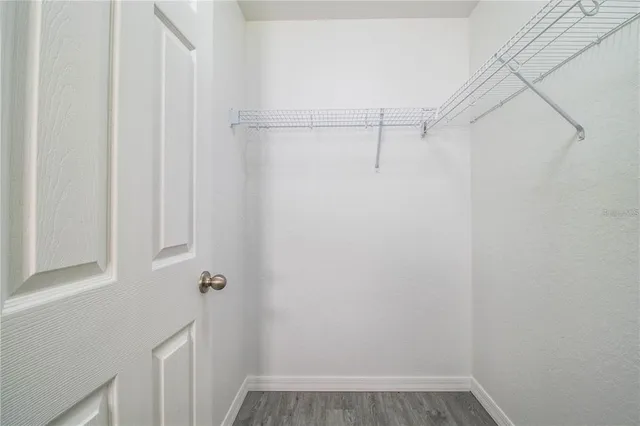 a view of a room with racks on the wall