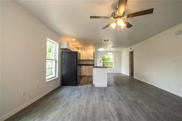 a view of kitchen and windows