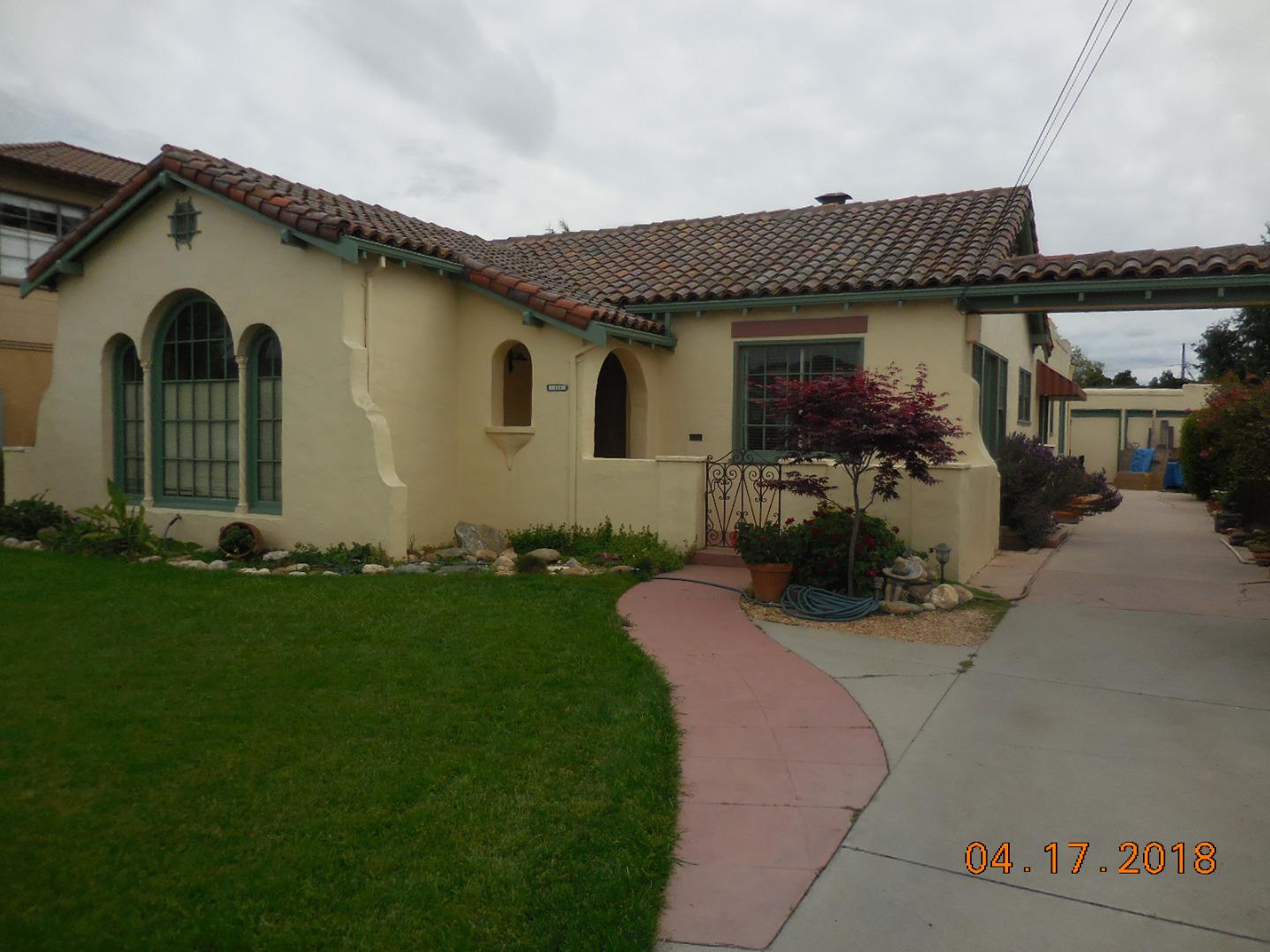 118 Willow Street Salinas, CA 93901 - Photo 1 of 24 a front view of a house with garden