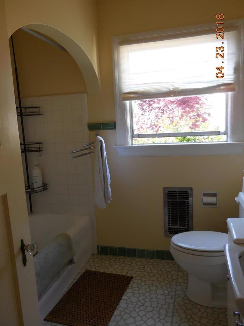 118 Willow Street Salinas, CA 93901 - Photo 13 of 24 a bathroom with a toilet and a shower