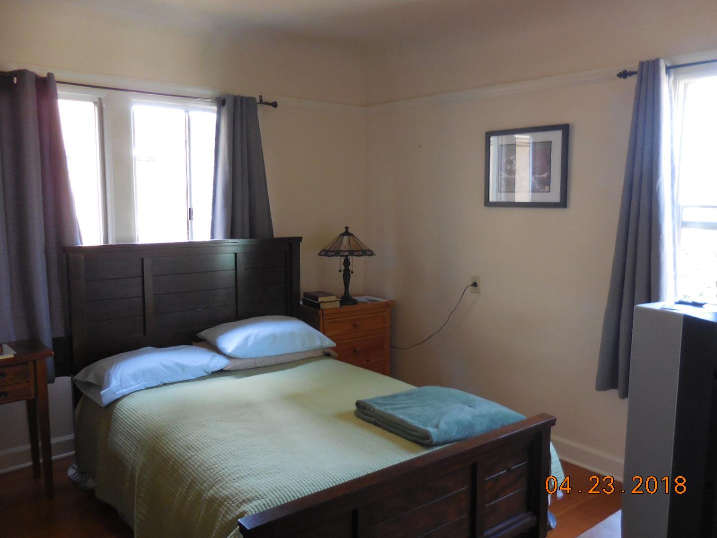 118 Willow Street Salinas, CA 93901 - Photo 15 of 24 a bedroom with a bed and a window