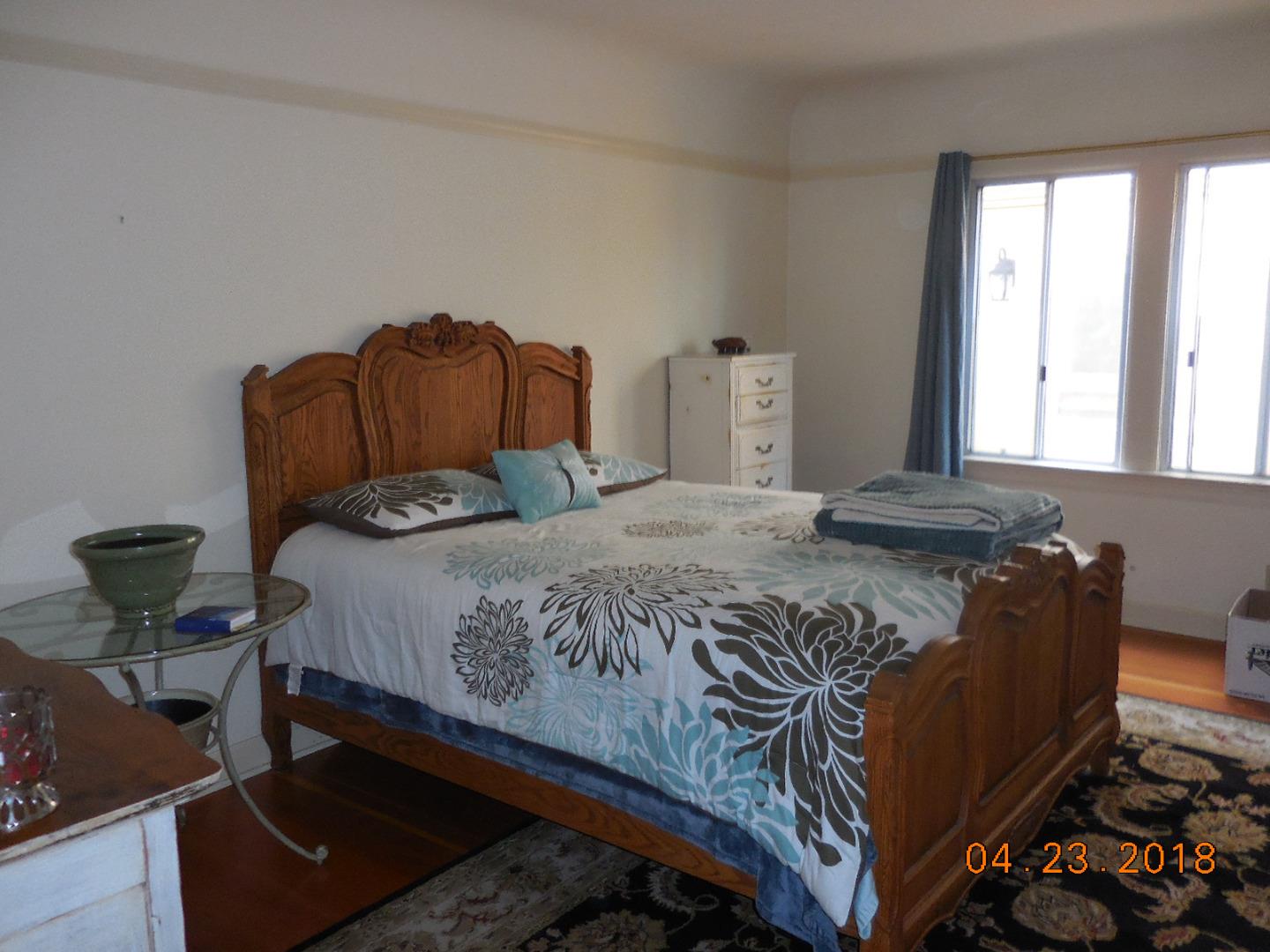 118 Willow Street Salinas, CA 93901 - Photo 16 of 24 a bedroom with a bed and window