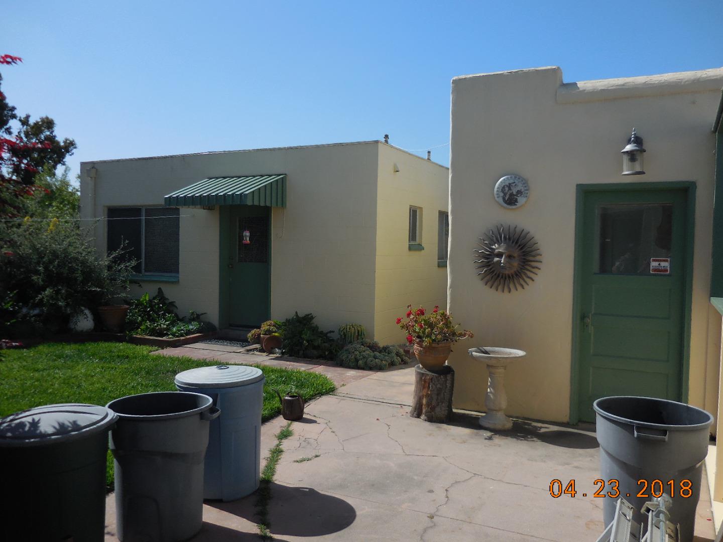 118 Willow Street Salinas, CA 93901 - Photo 22 of 24 a view of a patio with table and chairs and potted plants
