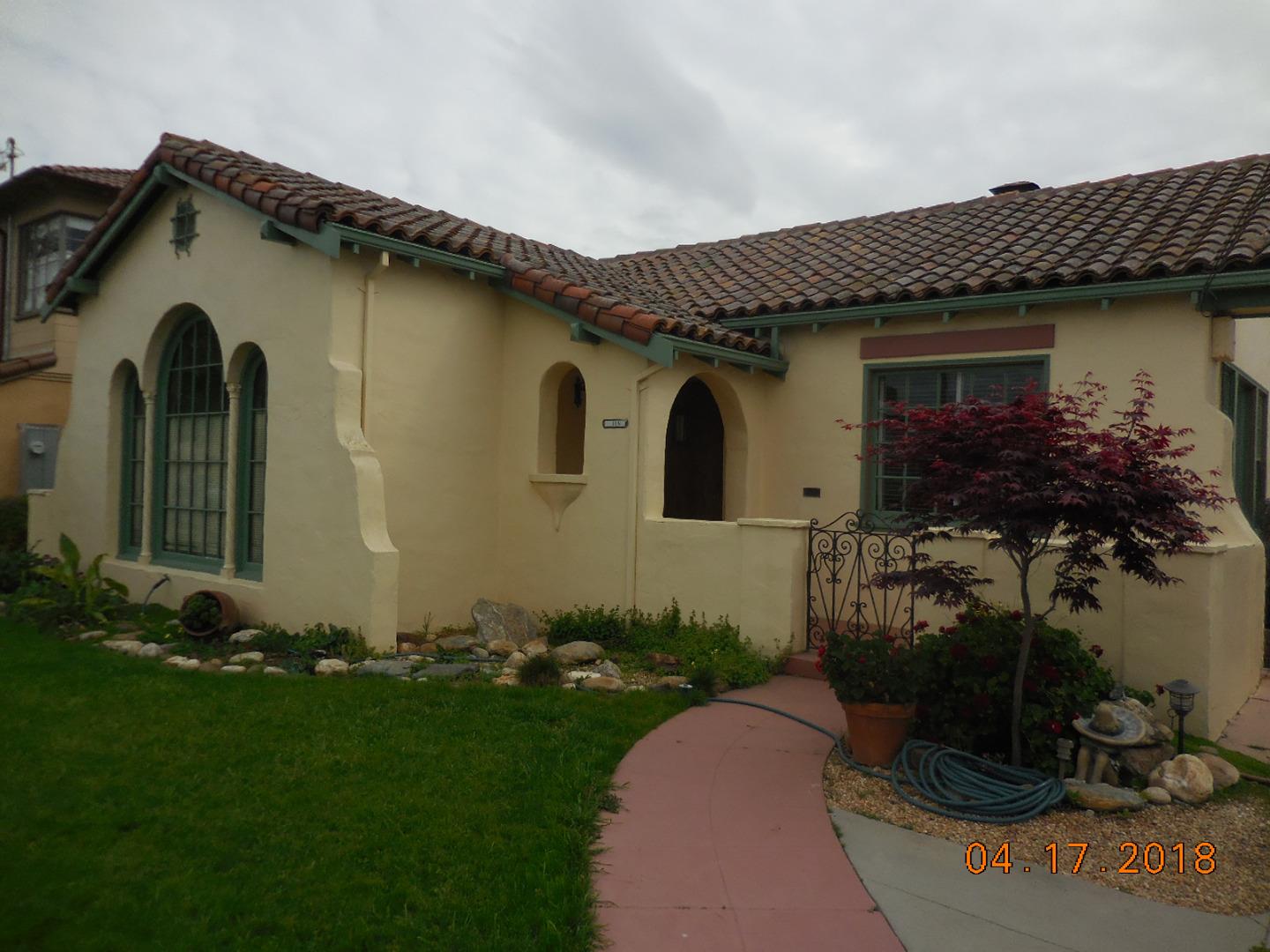 118 Willow Street Salinas, CA 93901 - Photo 3 of 24 a front view of a house with a garden