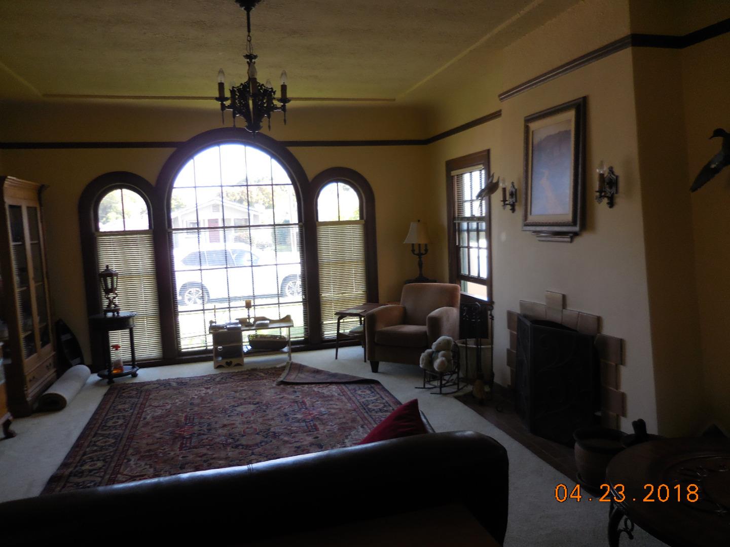118 Willow Street Salinas, CA 93901 - Photo 7 of 24 a living room with furniture and a large window