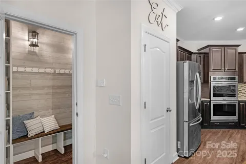 a bathroom with a shower and a sink