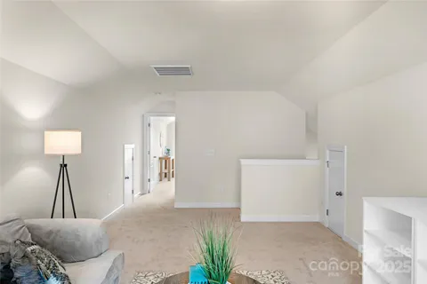 a view of a bedroom with closet