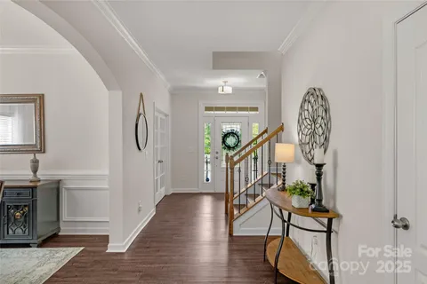 a view of entryway with wooden floor