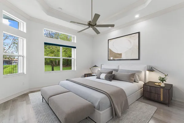 a bedroom with bed and window