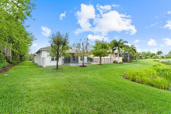 a view of a lake with a big yard