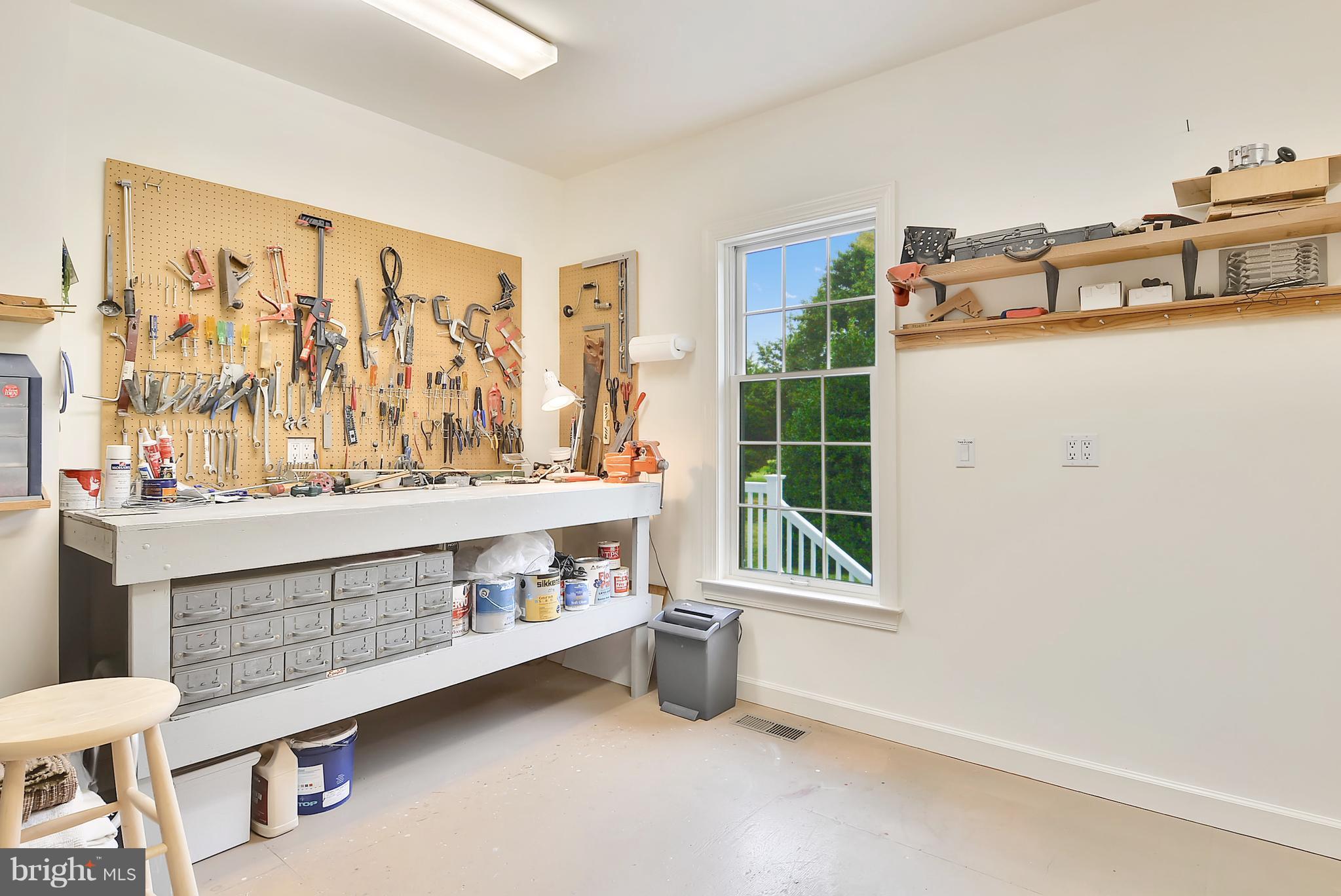 7314 Drum Point Road St. Michaels, MD 21663 - Photo 17 of 23 Workshop with double doors to garage