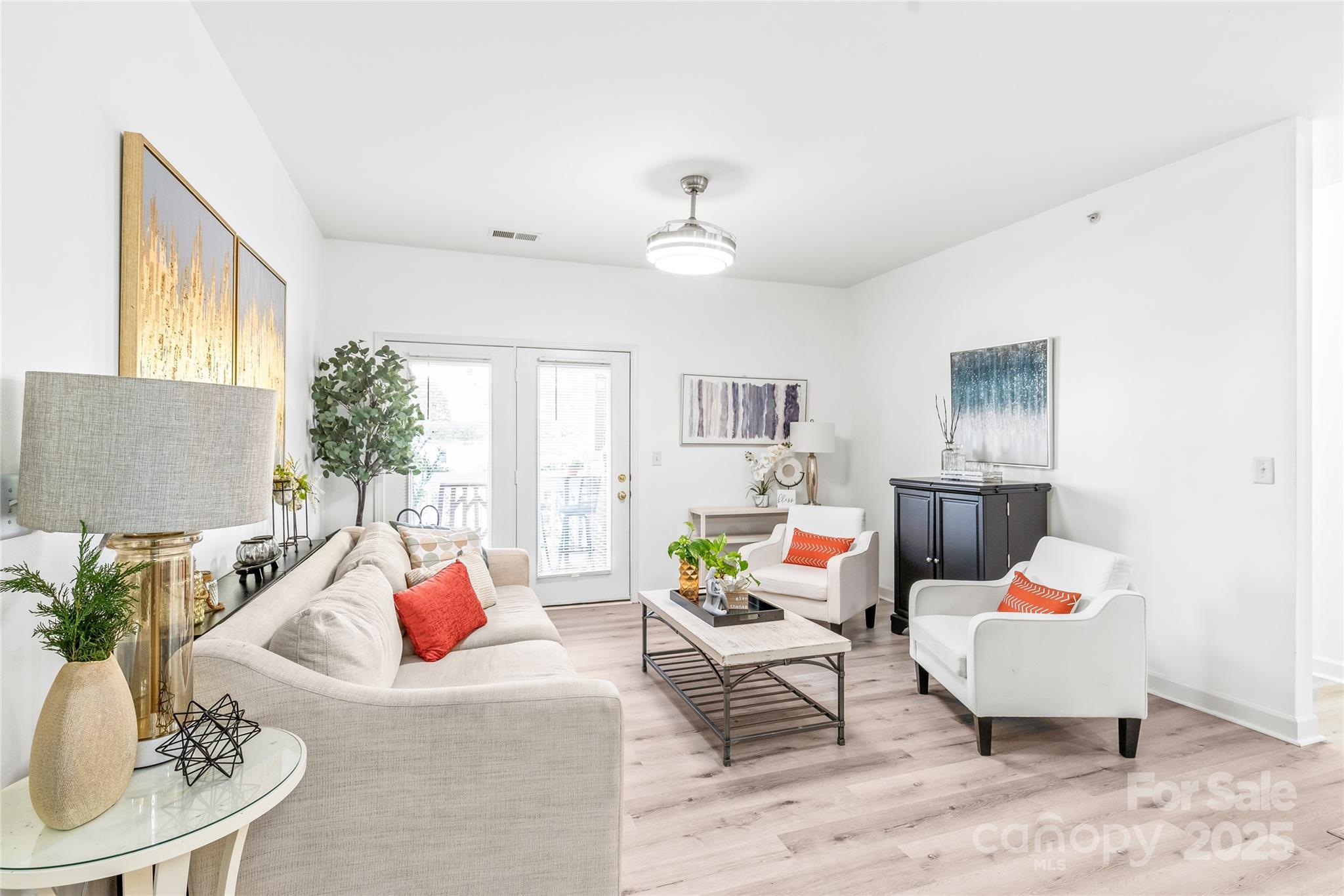 12357 Copper Mountain Boulevard Charlotte, NC 28277 - Photo 13 of 36 a living room with furniture and a table