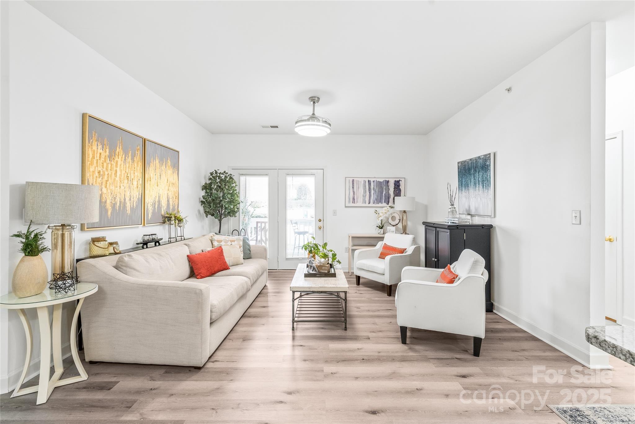 12357 Copper Mountain Boulevard Charlotte, NC 28277 - Photo 14 of 36 a living room with furniture and a large window