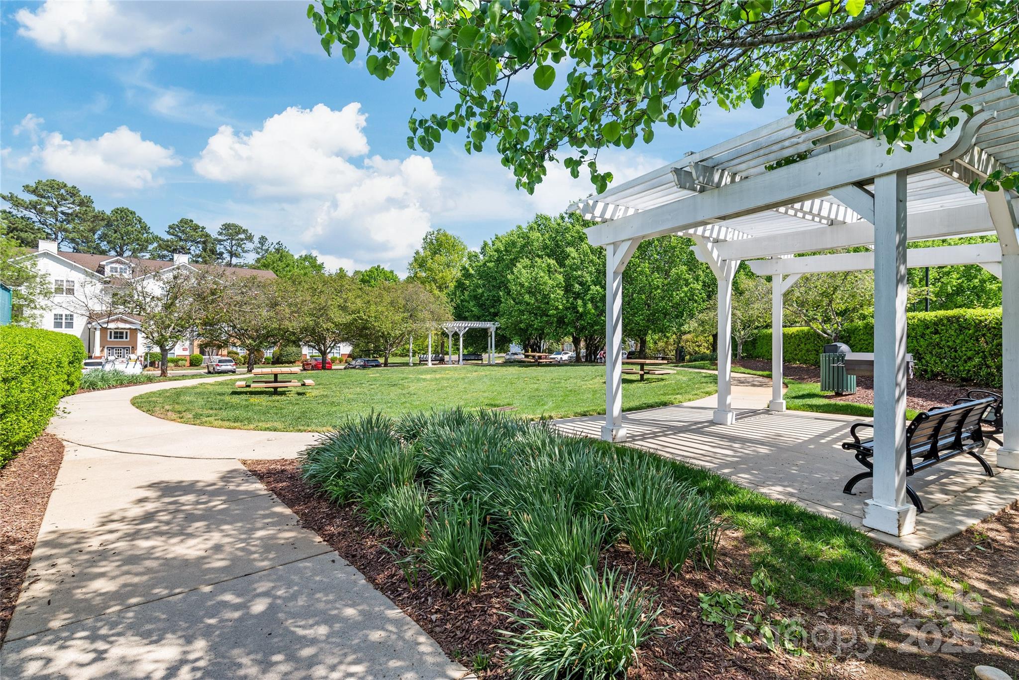 12357 Copper Mountain Boulevard Charlotte, NC 28277 - Photo 27 of 36 a view of a house with backyard and porch