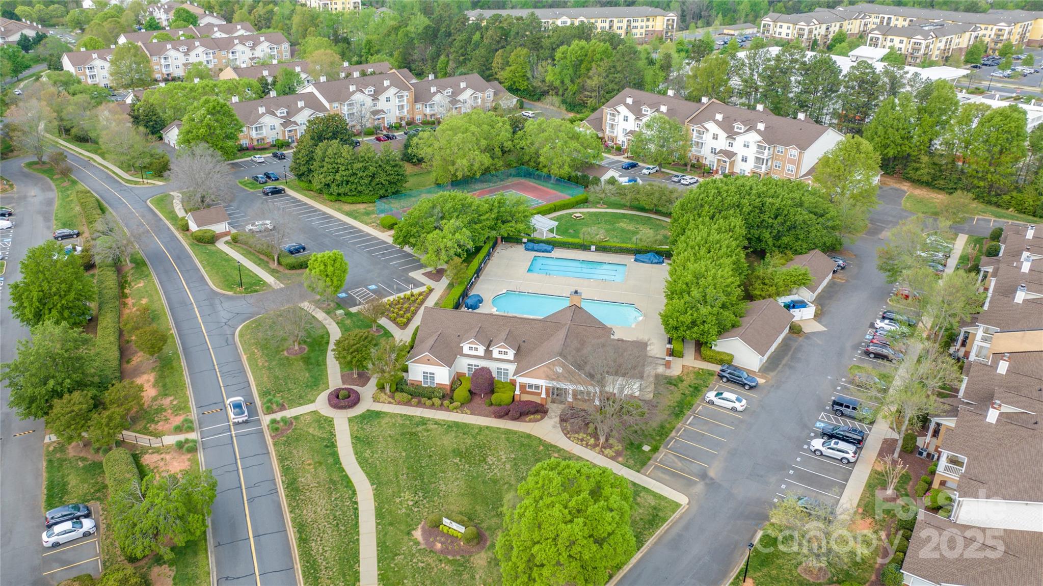 12357 Copper Mountain Boulevard Charlotte, NC 28277 - Photo 29 of 36 an aerial view of a swimming pool and outdoor space