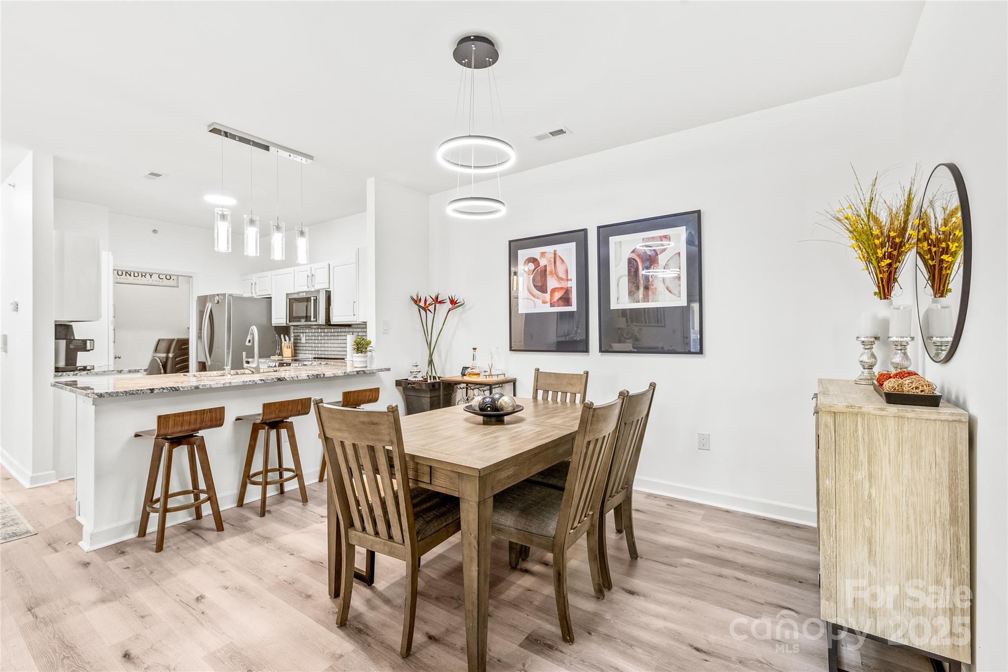 12357 Copper Mountain Boulevard Charlotte, NC 28277 - Photo 9 of 36 a view of a dining room with furniture