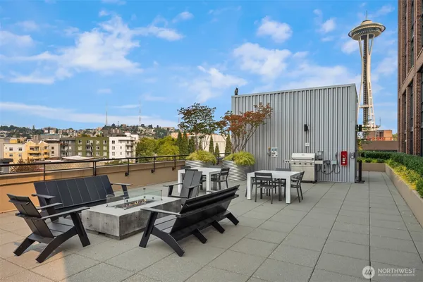 a view of city from terrace with seating space