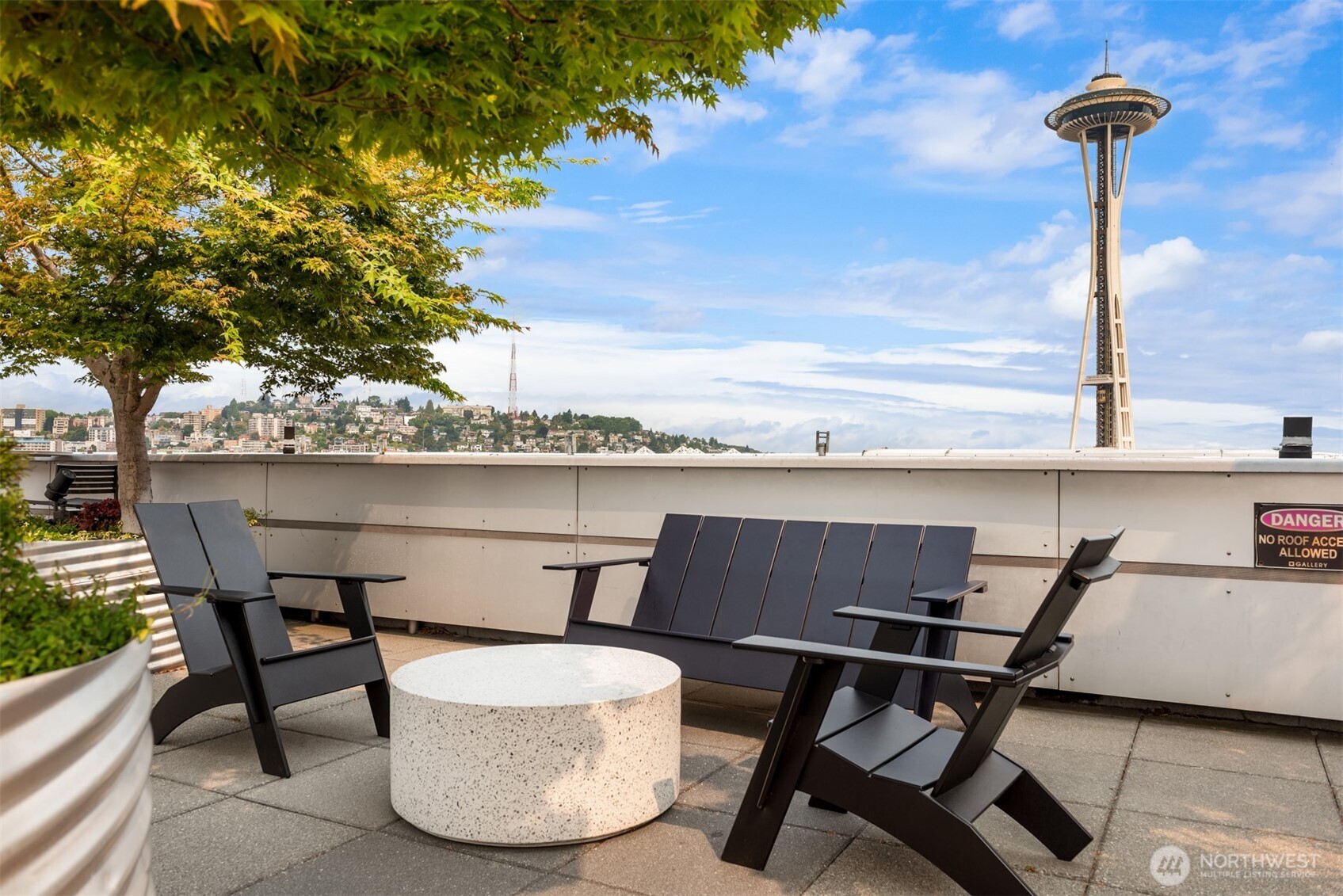 2911 2nd Avenue, Unit 310 Seattle, WA 98121 - Photo 34 of 40 a view of a chairs and table in the terrace