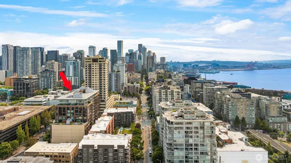 a view of a city with tall buildings