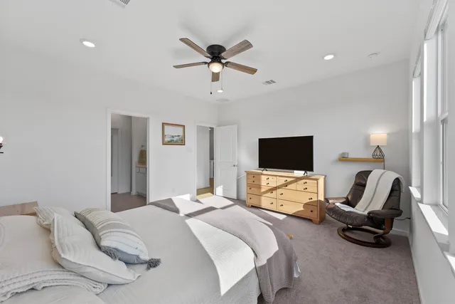 a bathroom with double sink and a mirror