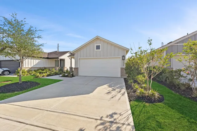 a house view with a garden space