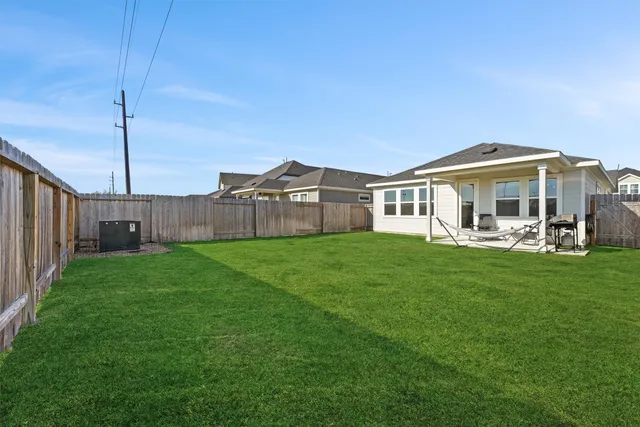 a room with lots of chairs and a table