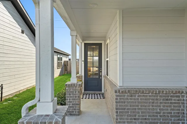 a view of a kitchen from the hallway