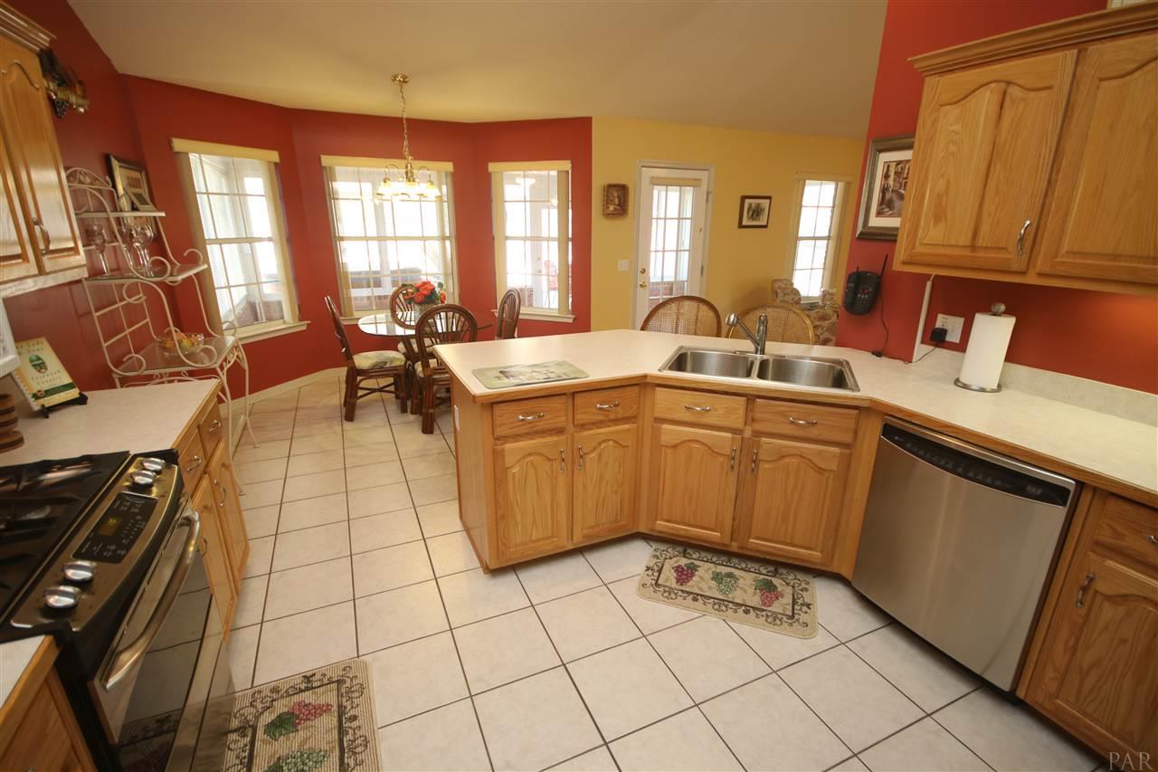 5337 Morgan Ridge Drive Milton, FL 32570 - Photo 19 of 50 Can lighting really brightens this works space!