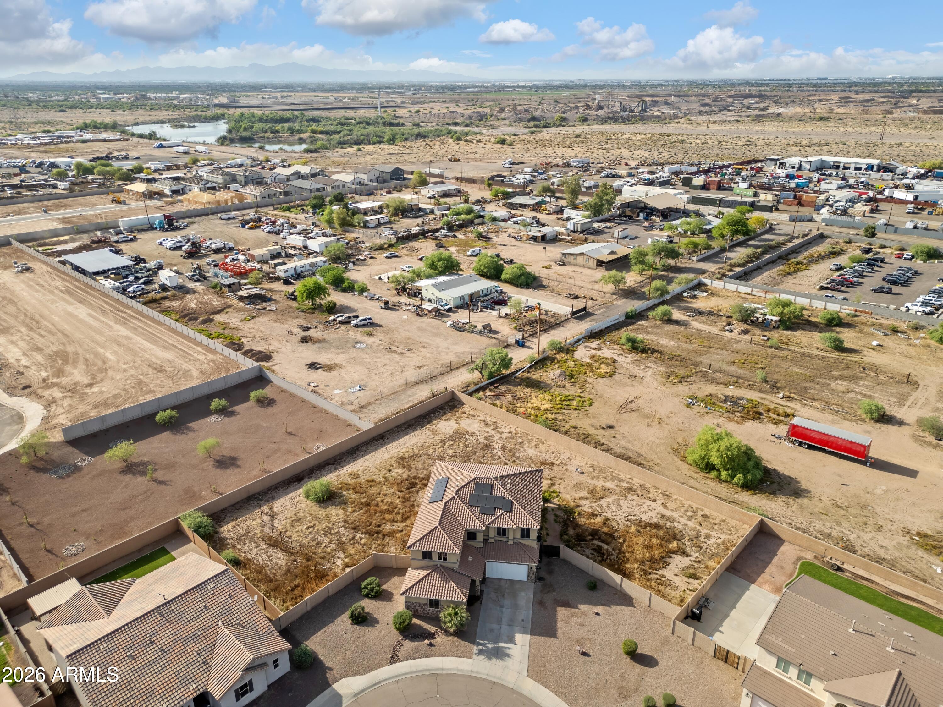 7634 West Apollo Road Laveen, AZ 85339 - Photo 30 of 34 an aerial view of residential building and outdoor space