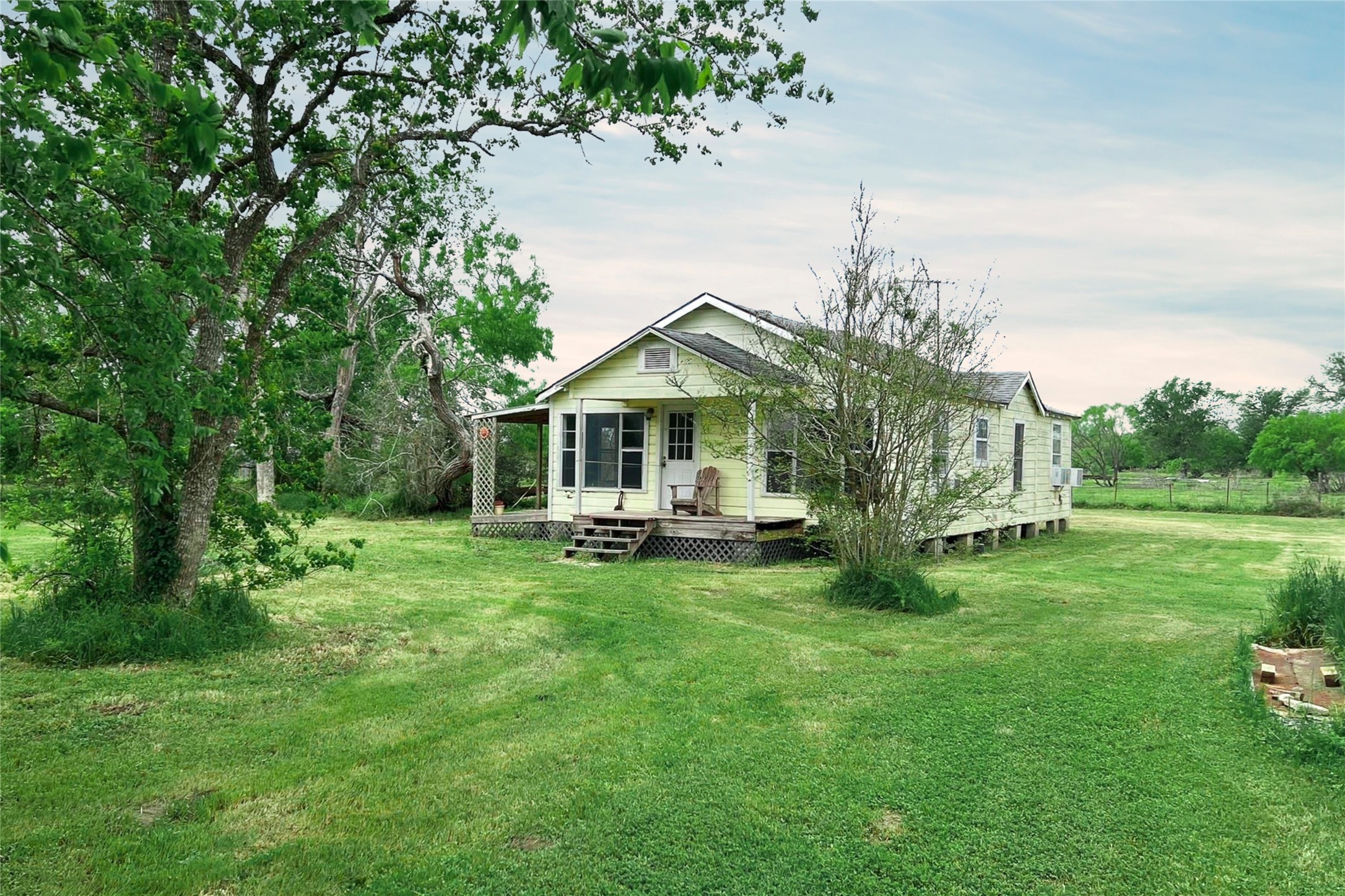 38440 Fisk Lane Pattison, TX 77423 - Photo 1 of 34 a front view of a house with yard porch and green space