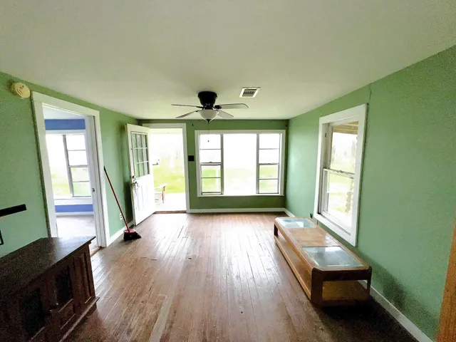 a view of an empty room and window